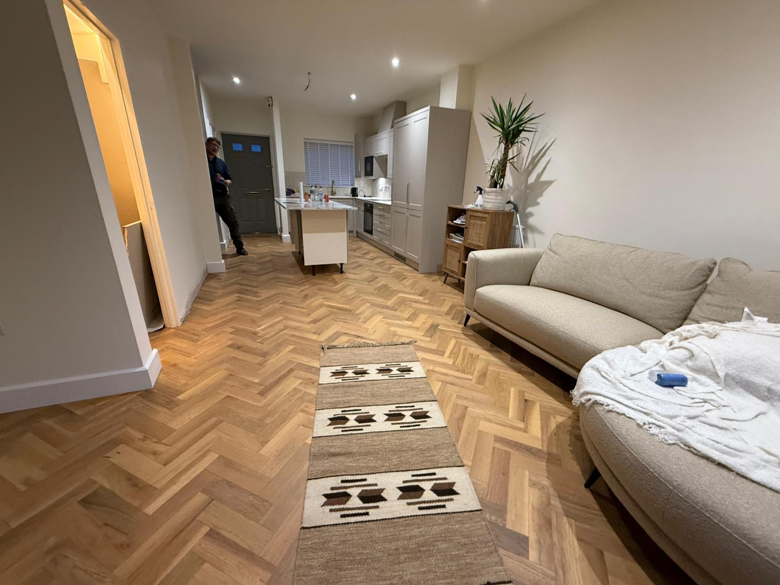 Herringbone laminate flooring Cardiff by House2Home Projects